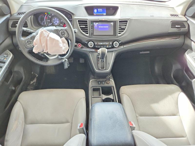 Photo 8 from auction – 2016 HONDA CR-V with VIN 2HKRM4H77GH719182