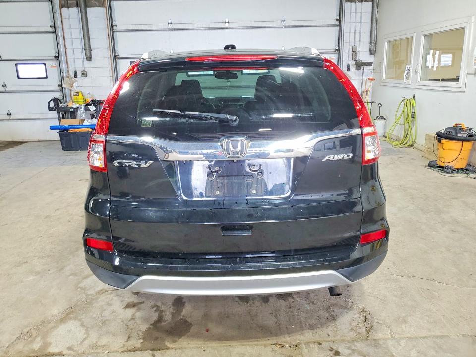 Photo 6 from auction – 2016 HONDA CR-V with VIN 5J6RM4H77GL030314