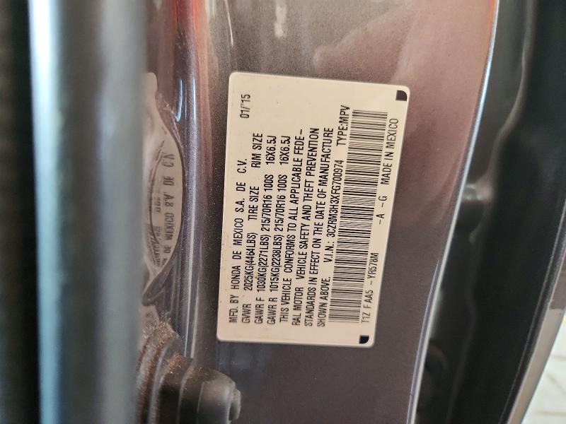 Photo 14 from auction – 2015 HONDA CR-V with VIN 3CZRM3H3XFG700974