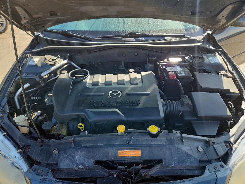 Photo 11 from auction – 2005 MAZDA 6 with VIN 1YVHP80C855M66920