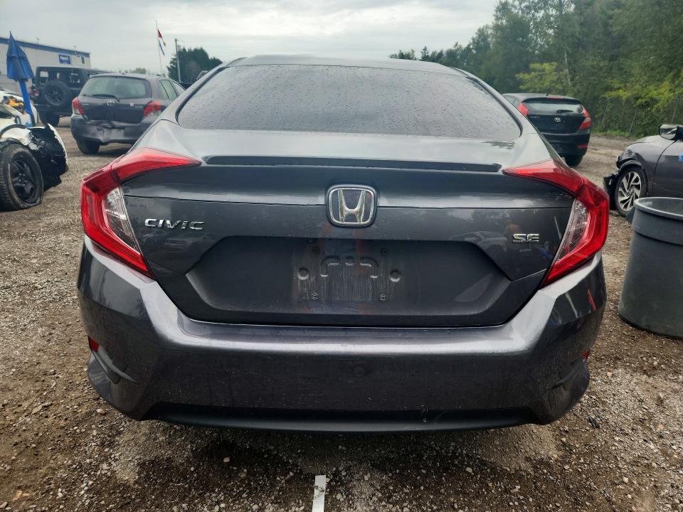 Photo 6 from auction – 2018 HONDA CIVIC with VIN 2HGFC2F64JH022266