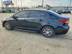 Photo 2 from auction – 2022 TOYOTA COROLLA with VIN JTDEAMDE2NJ036712