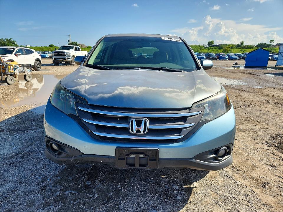 Photo 5 from auction – 2014 HONDA CR-V with VIN 2HKRM3H59EH510564