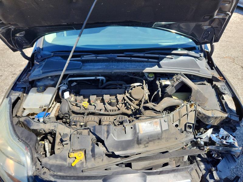 Photo 11 from auction – 2014 FORD FOCUS with VIN 1FADP3E24EL432126