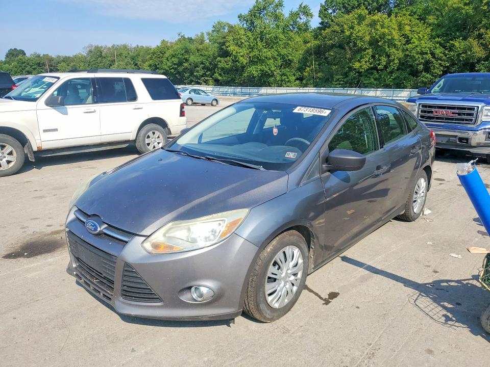 FORD FOCUS 2013 with VIN 1FADP3E23DL370989 - Photo from auction