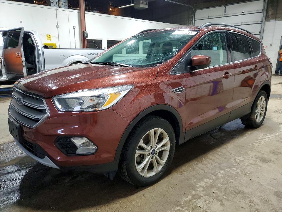 FORD ESCAPE 2018 with VIN 1FMCU9GD4JUA50243 - Photo from auction