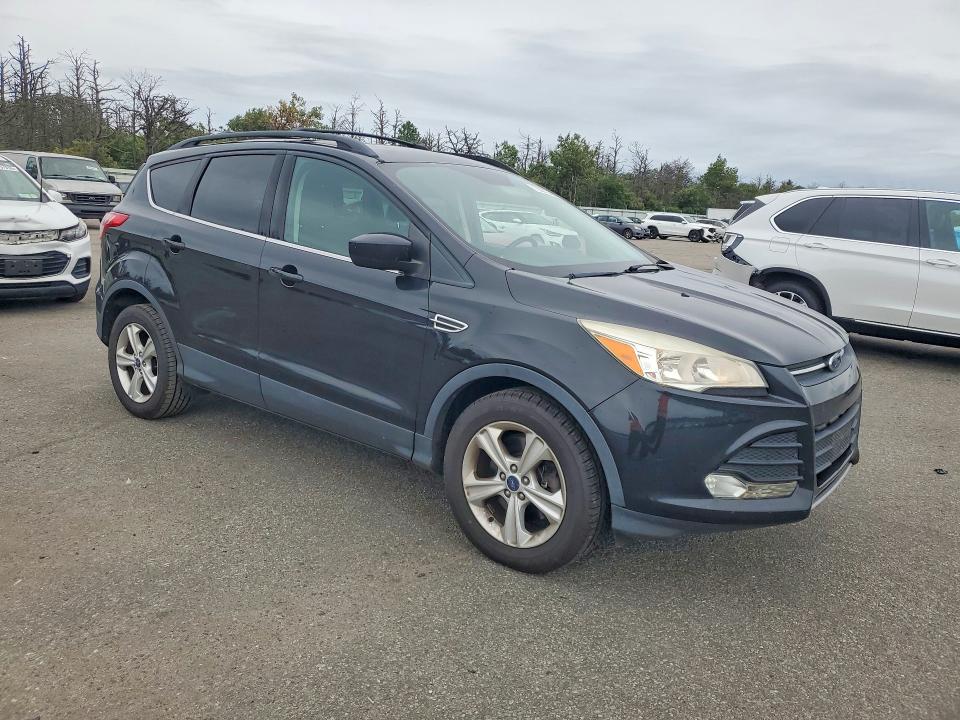 Photo 4 from auction – 2015 FORD ESCAPE with VIN 1FMCU9GX9FUB54521