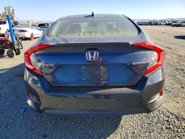 Photo 6 from auction – 2017 HONDA CIVIC with VIN 2HGFC1F9XHH634230