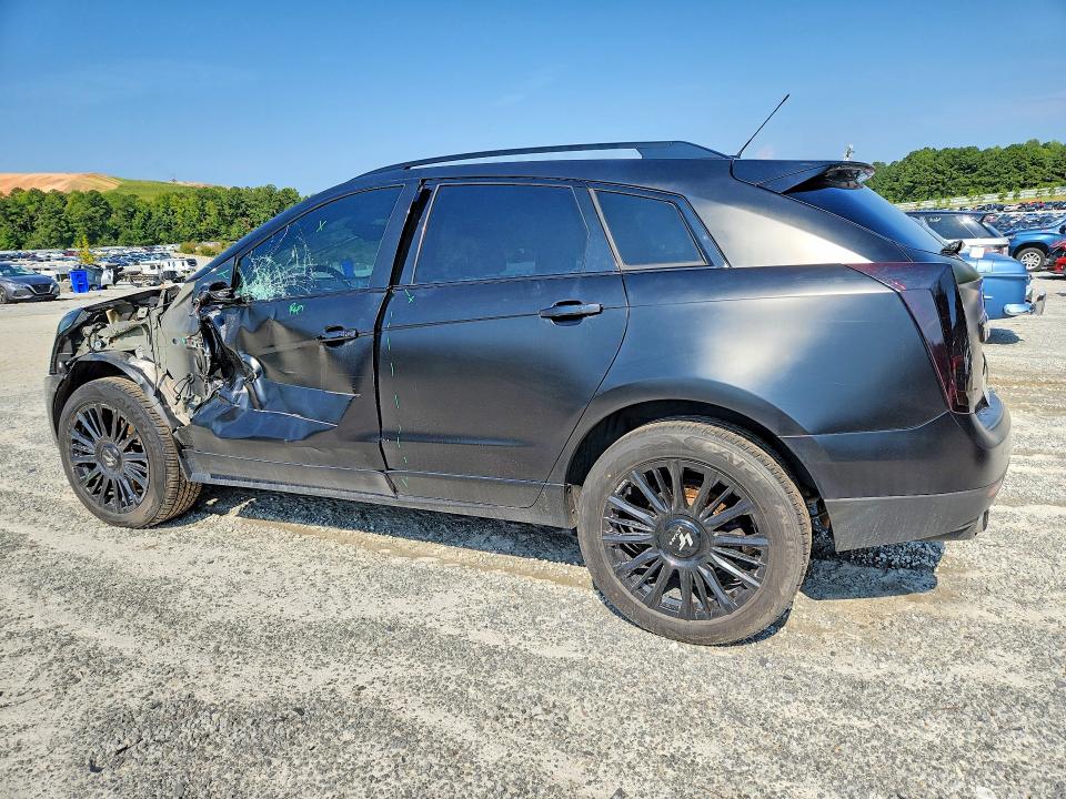 Снимка 2 от търг – 2016 CADILLAC SRX с VIN 3GYFNBE37GS504147