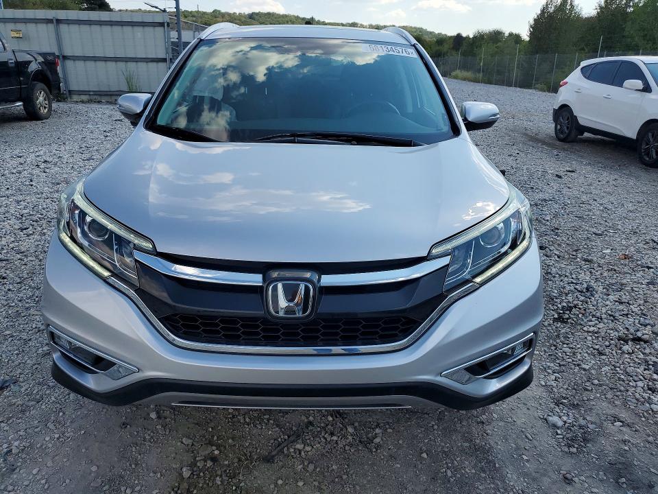Photo 5 from auction – 2016 HONDA CR-V with VIN 5J6RM4H92GL015463