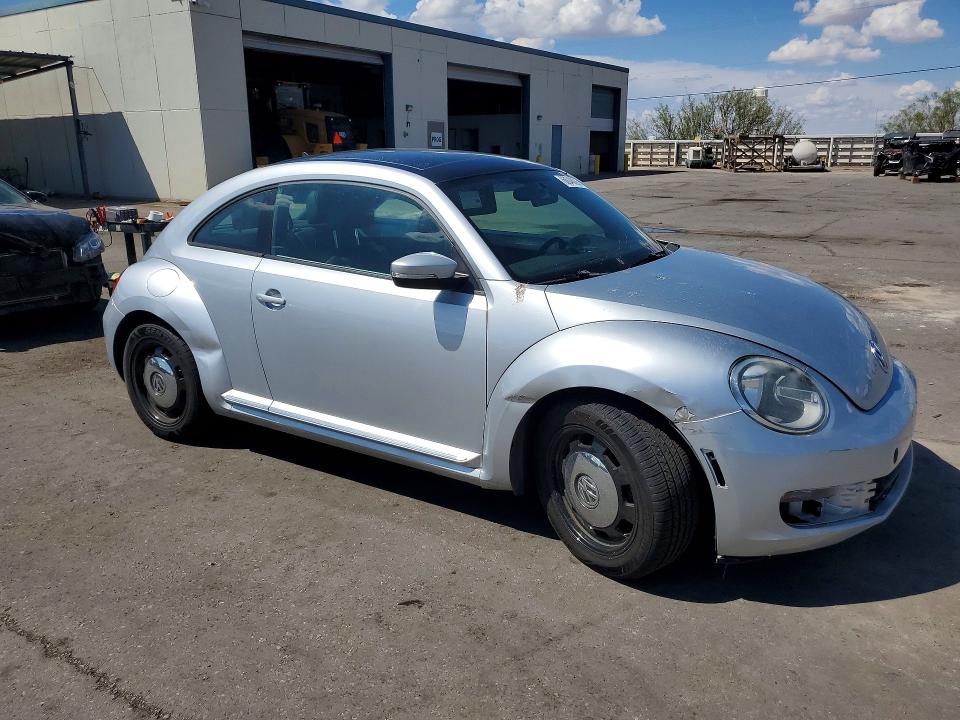 Photo 4 from auction – 2013 VOLKSWAGEN BEETLE with VIN 3VWJP7AT7DM676673