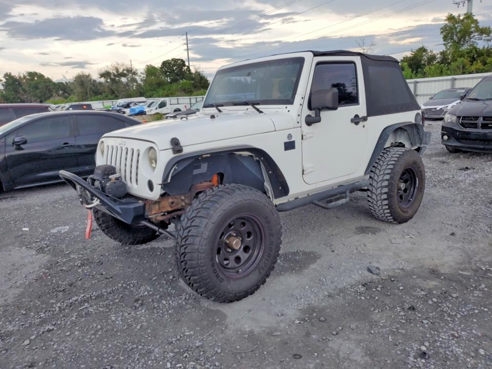 JEEP WRANGLER 2013 with VIN 1C4AJWAG0DL503581 - Photo from auction