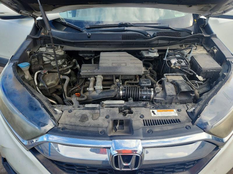 Photo 12 from auction – 2017 HONDA CR-V with VIN 2HKRW1H55HH502559