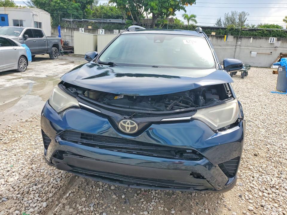 Photo 5 from auction – 2017 TOYOTA RAV4 with VIN JTMZFREV5HJ718972
