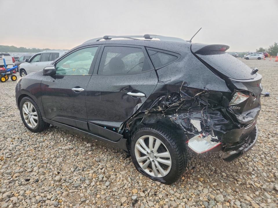 Photo 2 from auction – 2011 HYUNDAI TUCSON with VIN KM8JU3AC2BU172878