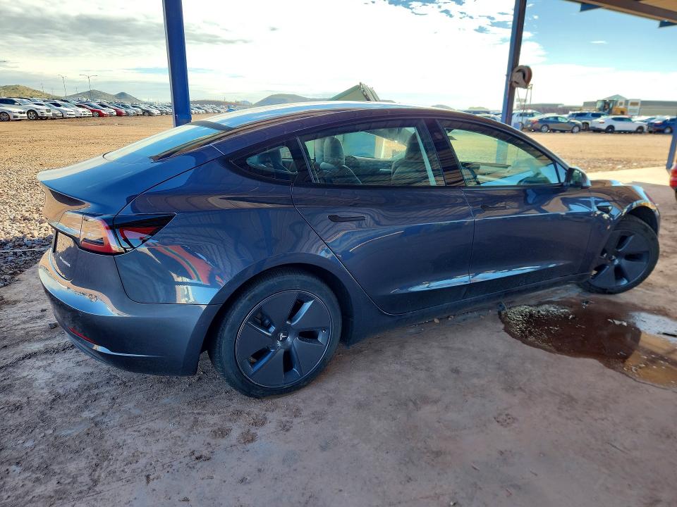 Снимка 3 от търг – 2022 TESLA MODEL 3 с VIN 5YJ3E1EB8NF299390