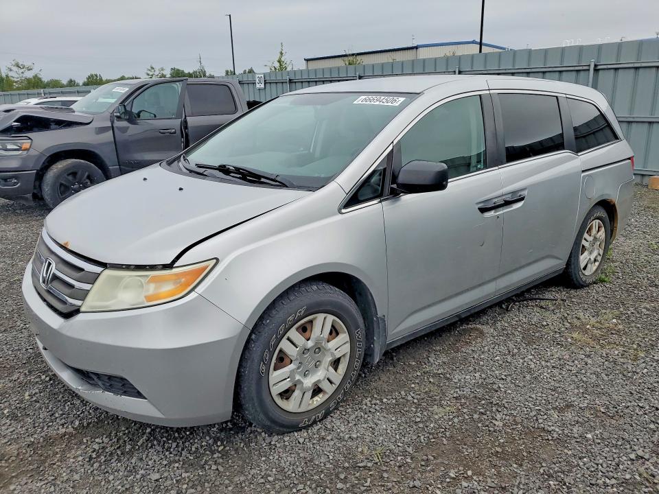HONDA ODYSSEY 2011 with VIN 5FNRL5H2XBB504092 - Photo from auction