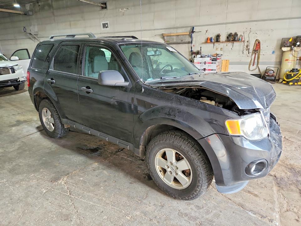 Photo 4 from auction – 2011 FORD ESCAPE with VIN 1FMCU0DG7BKA86676