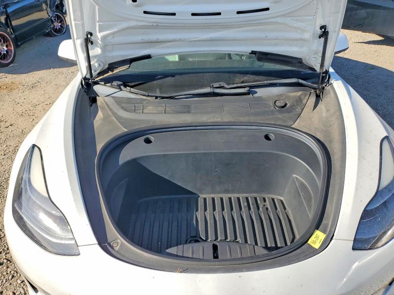 Снимка 11 от търг – 2021 TESLA MODEL 3 с VIN 5YJ3E1EC3MF000928