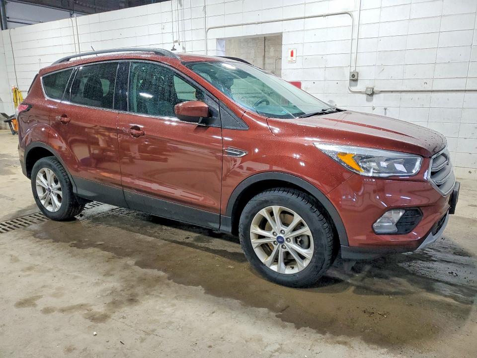 Photo 4 from auction – 2018 FORD ESCAPE with VIN 1FMCU9GD4JUA50243
