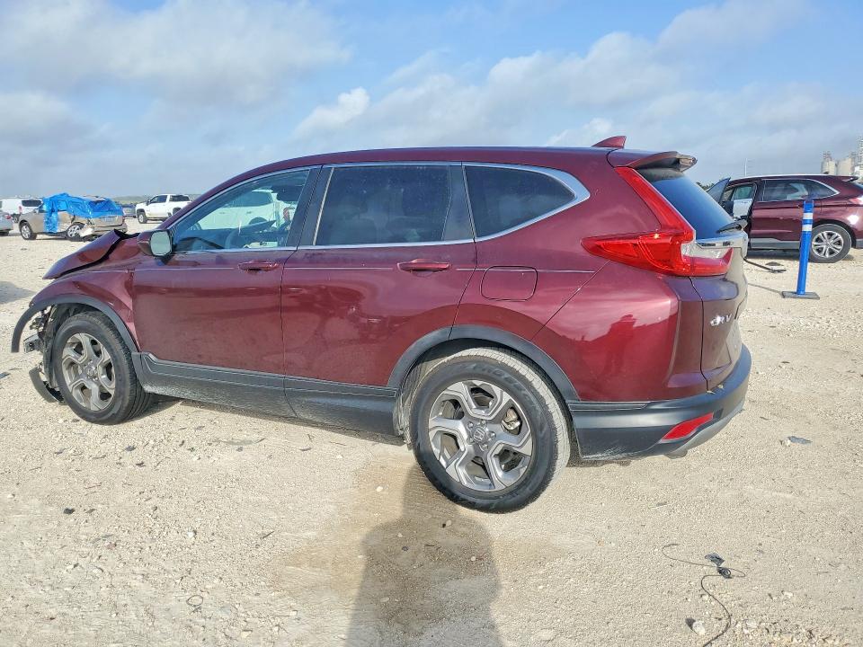 Photo 2 from auction – 2018 HONDA CR-V with VIN 7FARW1H58JE052835
