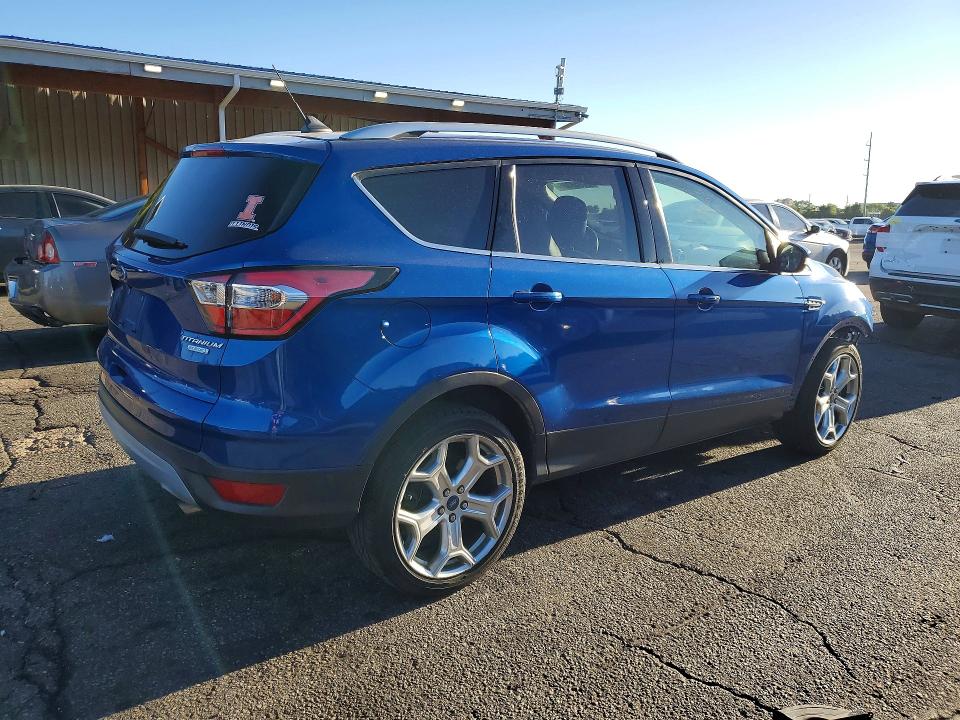 Photo 3 from auction – 2018 FORD ESCAPE with VIN 1FMCU0J95JUD55685