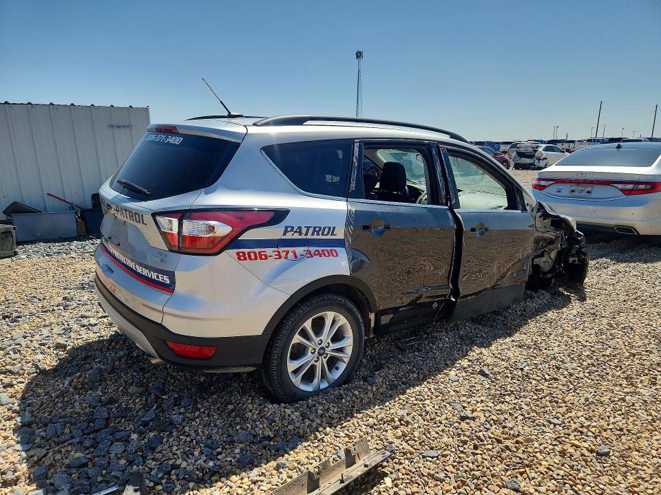 Photo 3 from auction – 2018 FORD ESCAPE with VIN 1FMCU9GD0JUB94565