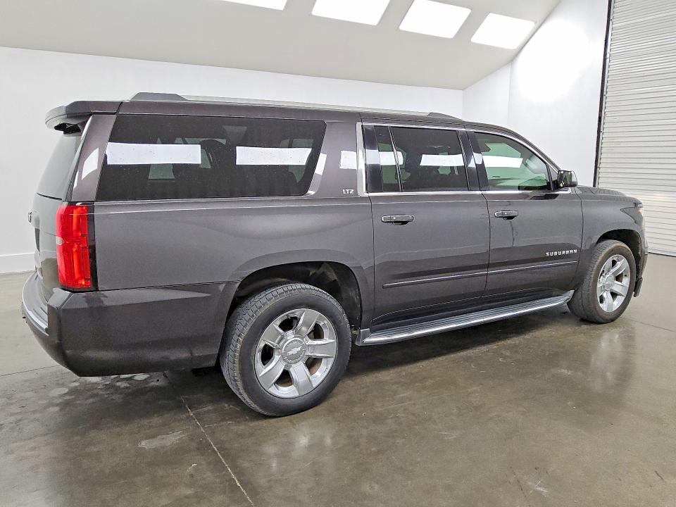 Photo 3 from auction – 2016 CHEVROLET SUBURBAN with VIN 1GNSCJKC7GR248496
