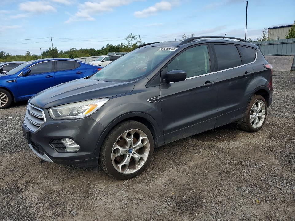 FORD ESCAPE 2018 с VIN 1FMCU9HD1JUA67385 - Снимка от търг