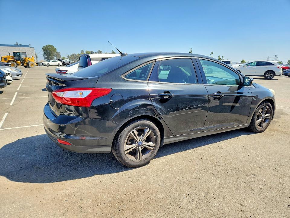 Photo 3 from auction – 2014 FORD FOCUS with VIN 1FADP3F20EL391265