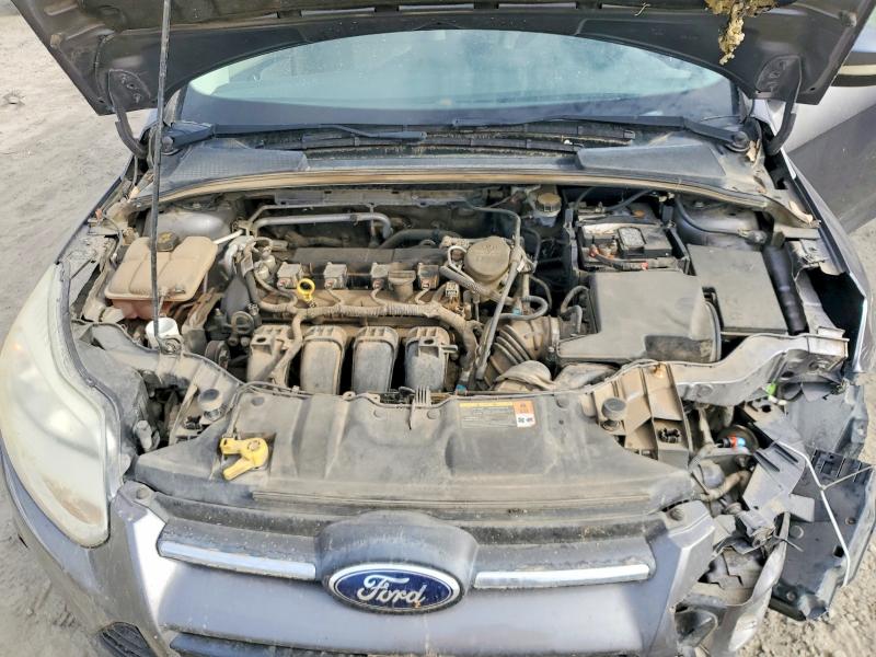 Photo 11 from auction – 2014 FORD FOCUS with VIN 1FADP3F21EL186005
