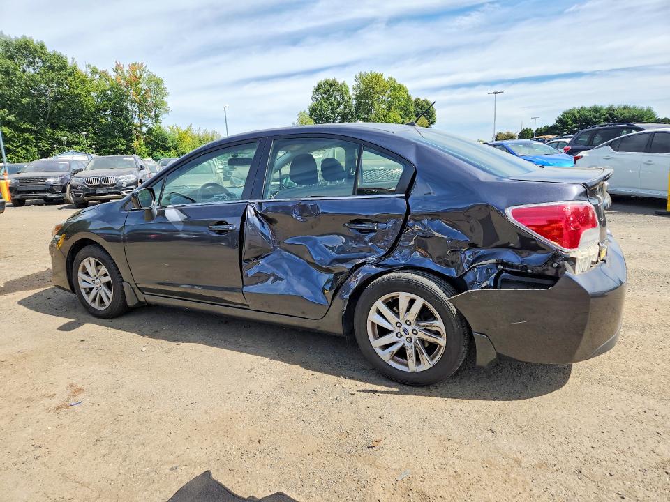 Снимка 2 от търг – 2016 SUBARU IMPREZA с VIN JF1GJAB60GH005803