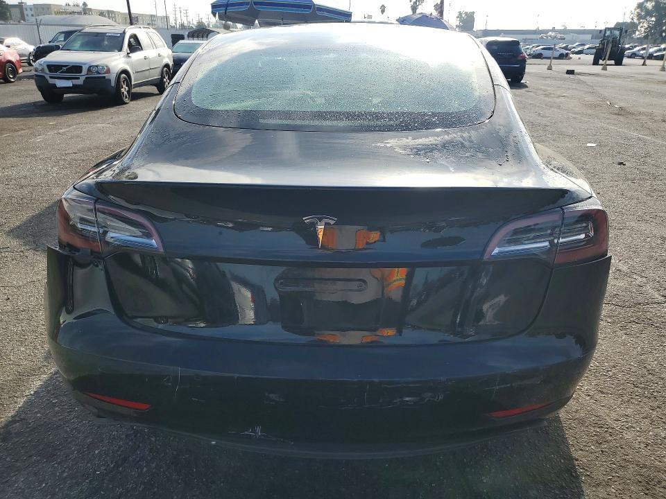 Снимка 6 от търг – 2022 TESLA MODEL 3 с VIN 5YJ3E1EA4NF359043