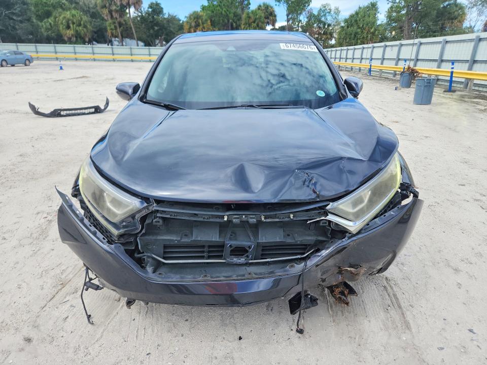 Photo 5 from auction – 2017 HONDA CR-V with VIN 7FARW1H83HE010366
