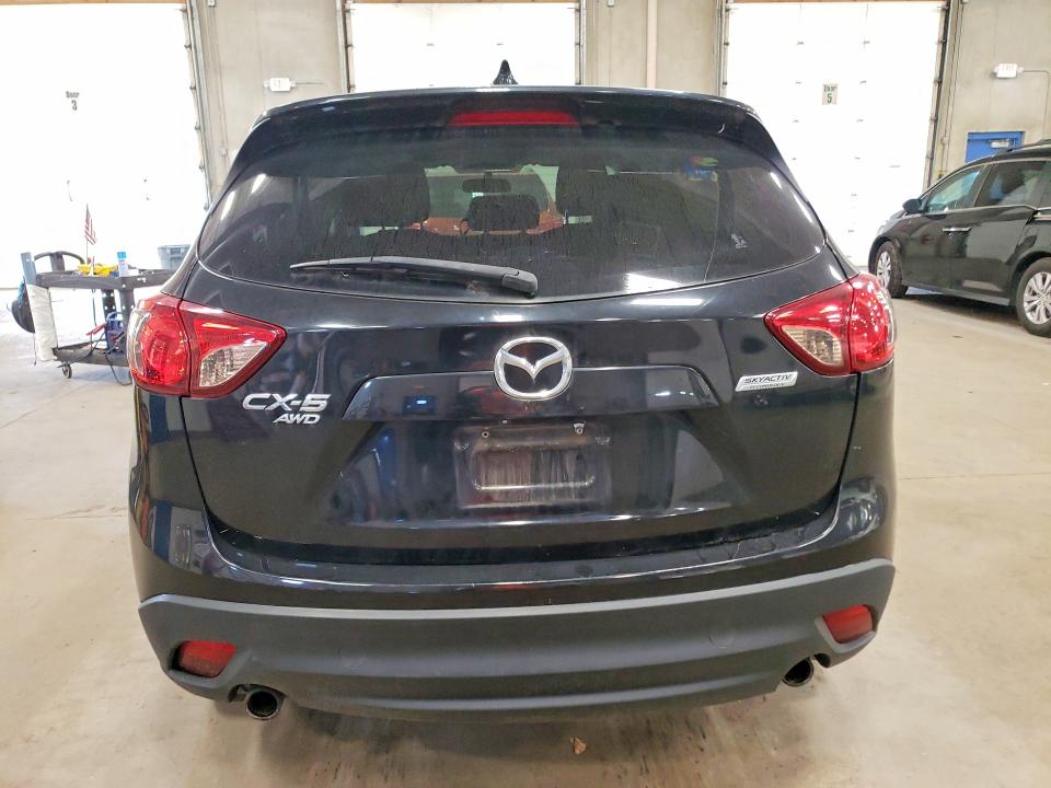Photo 6 from auction – 2013 MAZDA CX-5 with VIN JM3KE4CEXD0146640