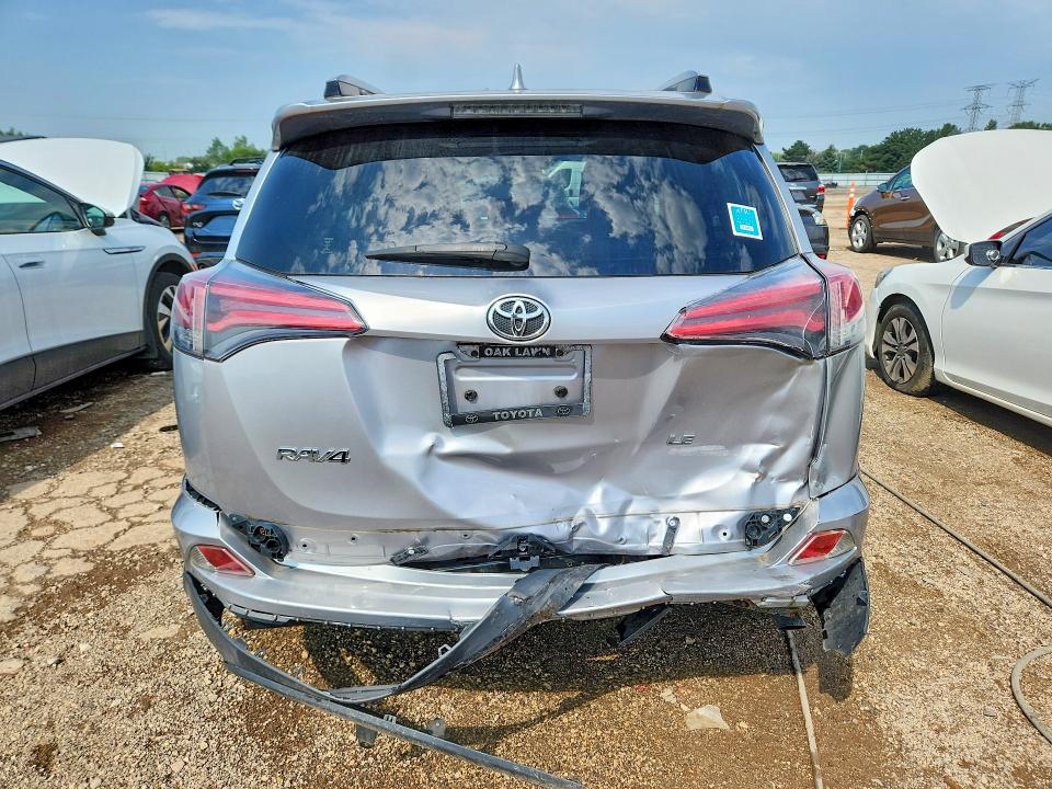 Photo 6 from auction – 2018 TOYOTA RAV4 with VIN JTMZFREV3JJ197692