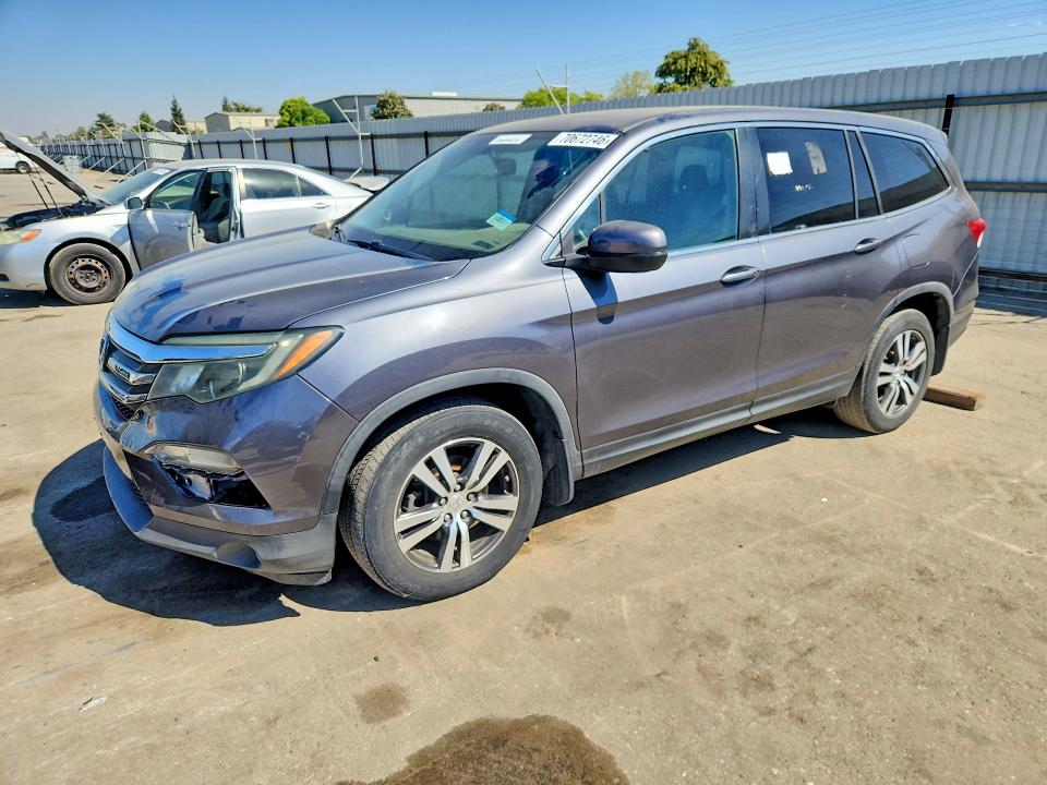 HONDA PILOT 2016 with VIN 5FNYF5H71GB037988 - Photo from auction
