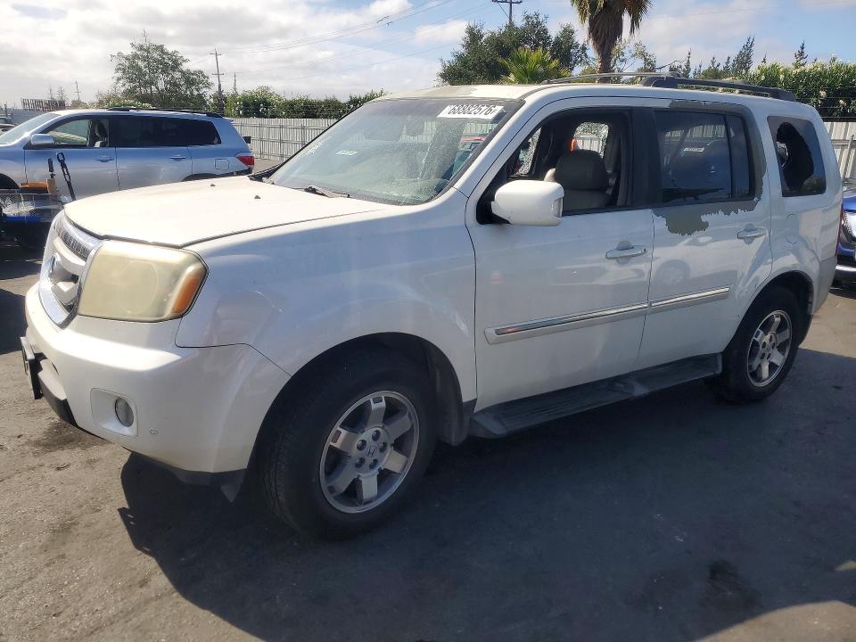 HONDA PILOT 2011 с VIN 5FNYF3H96BB023339 - Снимка от търг