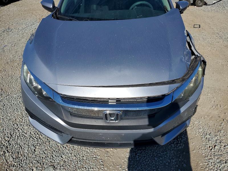Photo 11 from auction – 2018 HONDA CIVIC with VIN 2HGFC2F55JH572339