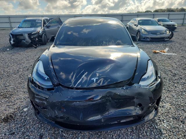 Снимка 5 от търг – 2022 TESLA MODEL 3 с VIN 5YJ3E1EA2NF188857