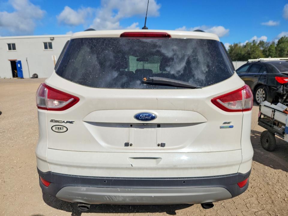 Снимка 6 от търг – 2014 FORD ESCAPE с VIN 1FMCU9G96EUD47368
