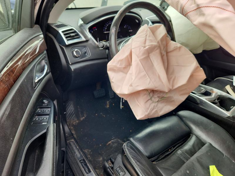 Photo 8 from auction – 2015 CADILLAC SRX with VIN 3GYFNBE30FS524660
