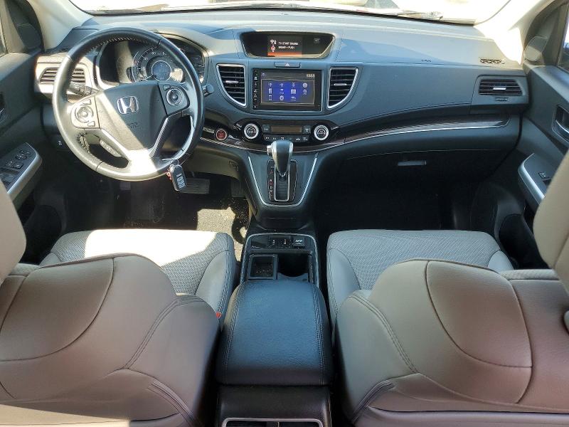 Photo 8 from auction – 2015 HONDA CR-V with VIN 2HKRM3H77FH546658