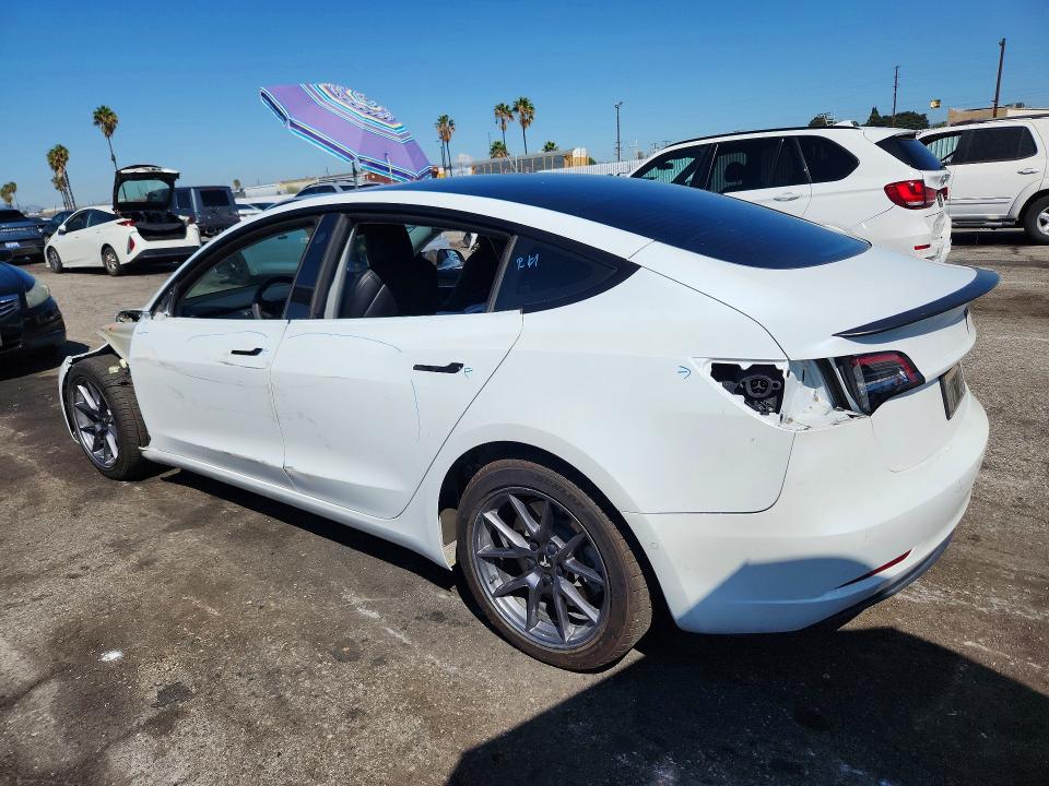 Фото 2 с аукциона – 2022 TESLA MODEL 3 с VIN 5YJ3E1EB5NF206423