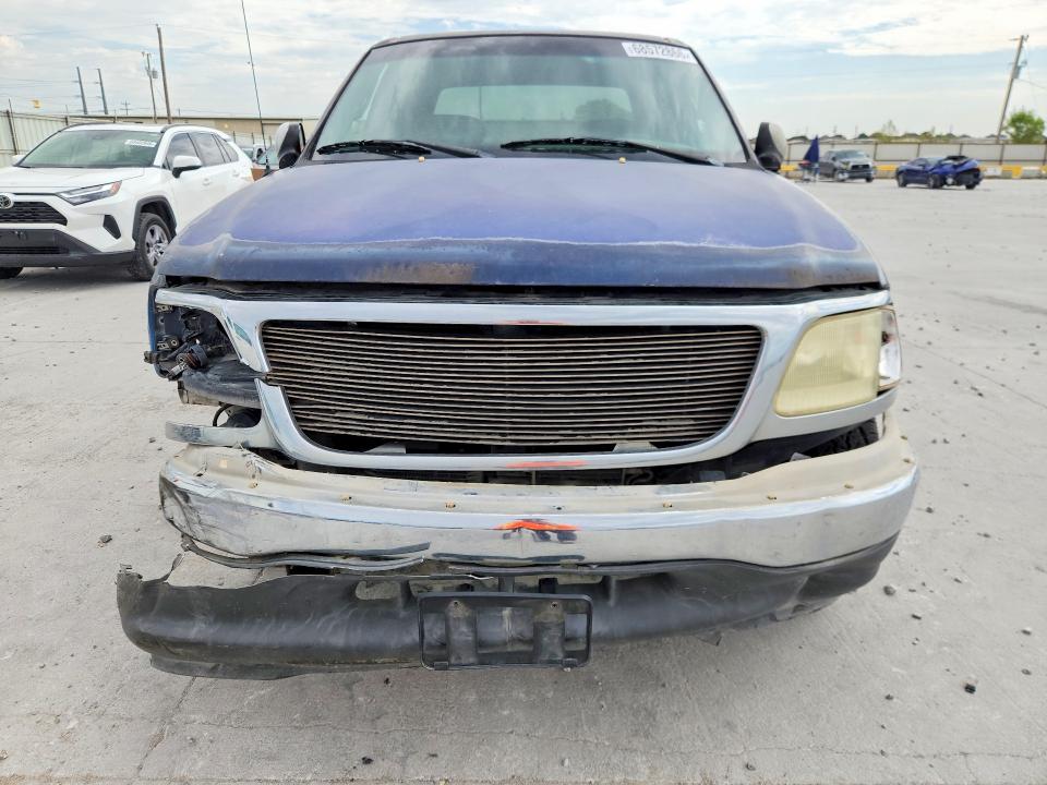 Photo 5 from auction – 2002 FORD F150 with VIN 1FTRW076X2KA67292