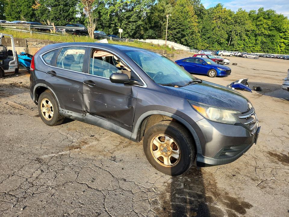Photo 4 from auction – 2013 HONDA CR-V with VIN 2HKRM4H30DH681450