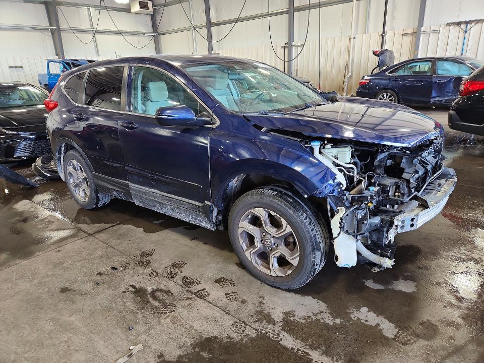 Photo 4 from auction – 2019 HONDA CR-V with VIN 7FARW2H50KE007041