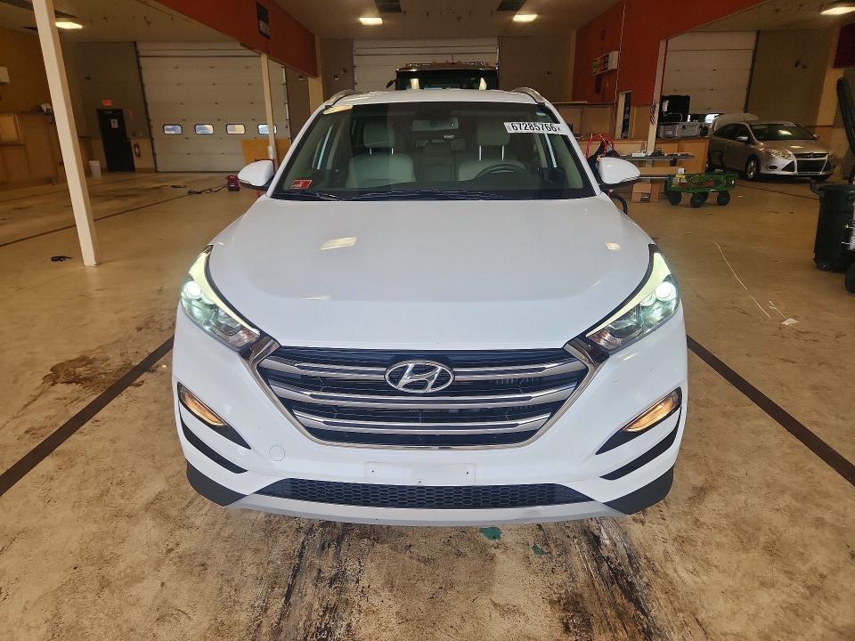 Photo 5 from auction – 2018 HYUNDAI TUCSON with VIN KM8J3CA2XJU653227