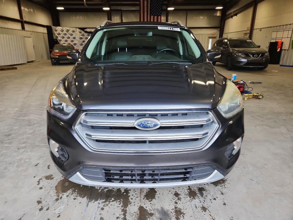 Photo 5 from auction – 2017 FORD ESCAPE with VIN 1FMCU9J94HUD57989