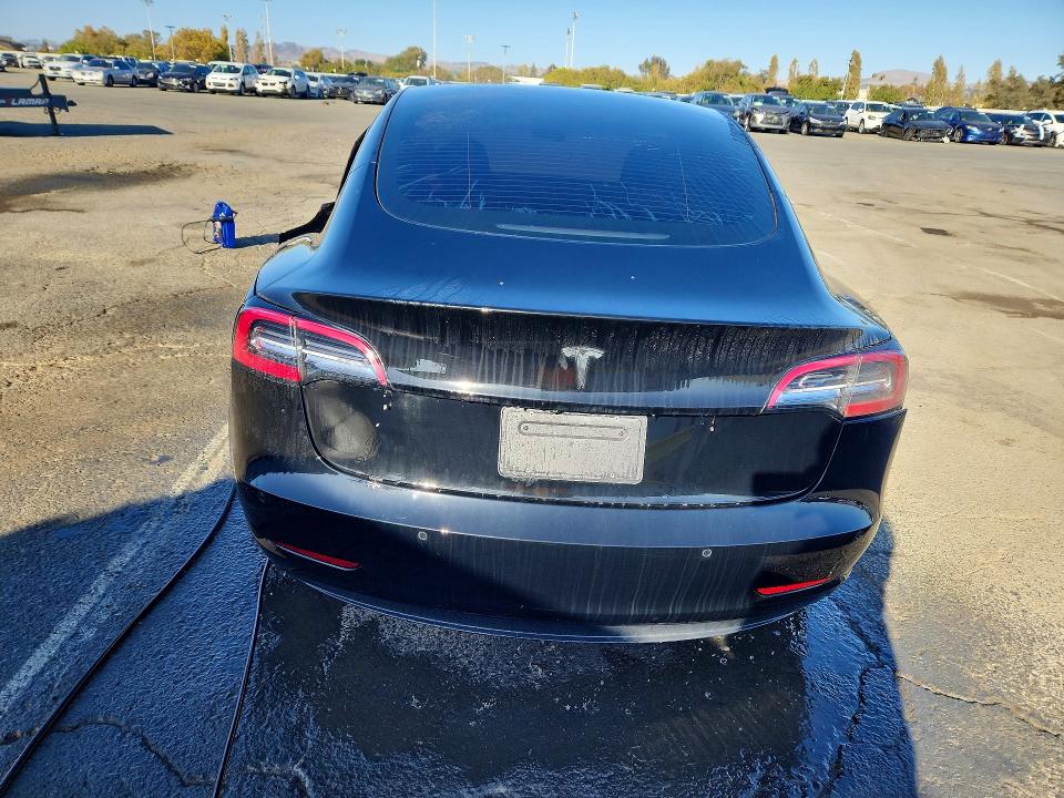 Снимка 6 от търг – 2021 TESLA MODEL 3 с VIN 5YJ3E1EAXMF929478